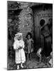 Lorenza Curiel in White First Communion Dress Waiting for Mother to Lock Door-W^ Eugene Smith-Mounted Photographic Print
