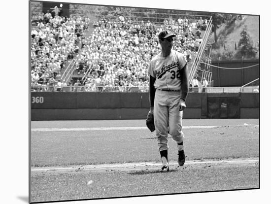 Los Angeles Dodgers Pitcher Sandy Koufax Taking the Field During Game Against the Milwaukee Braves-Robert W^ Kelley-Mounted Premium Photographic Print