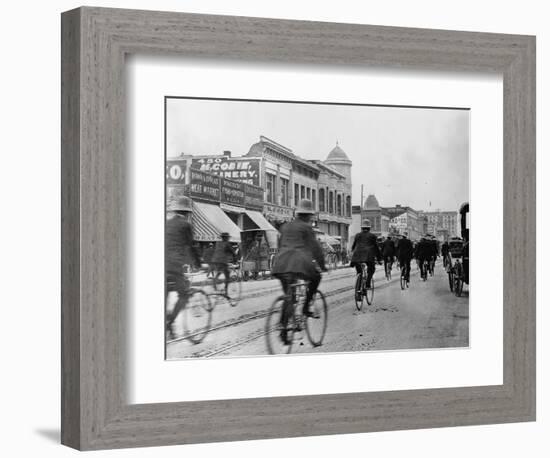 Los Angeles Police Officers Bicycling Past Broadway Storefronts-null-Framed Photographic Print