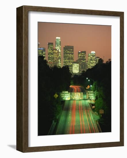 Los Angeles Skyline and Freeway, Illuminated at Night, California, USA-Howell Michael-Framed Photographic Print