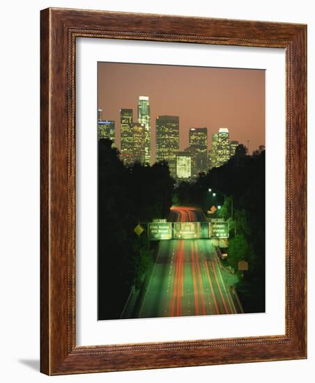 Los Angeles Skyline and Freeway, Illuminated at Night, California, USA-Howell Michael-Framed Photographic Print