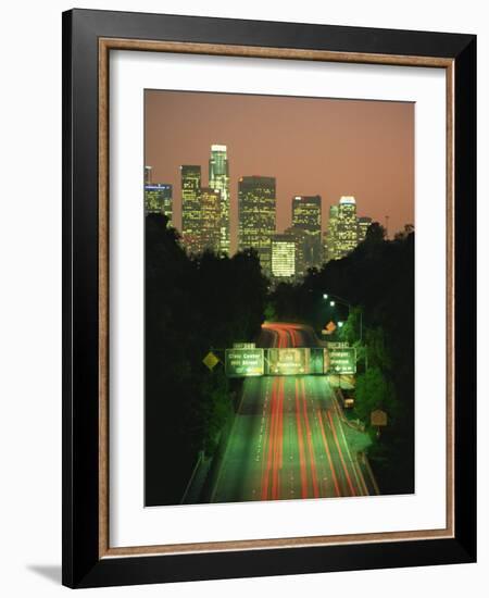 Los Angeles Skyline and Freeway, Illuminated at Night, California, USA-Howell Michael-Framed Photographic Print