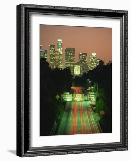 Los Angeles Skyline and Freeway, Illuminated at Night, California, USA-Howell Michael-Framed Photographic Print