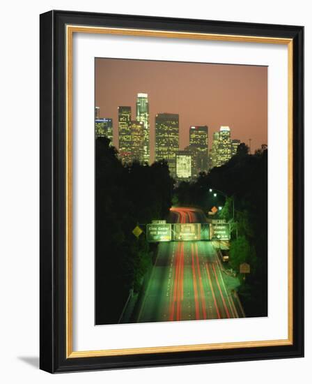 Los Angeles Skyline and Freeway, Illuminated at Night, California, USA-Howell Michael-Framed Photographic Print