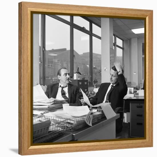 Lost Order? Two Salesmen Try to Sort Out the Orders over a Cigarette, 1967-Michael Walters-Framed Premier Image Canvas