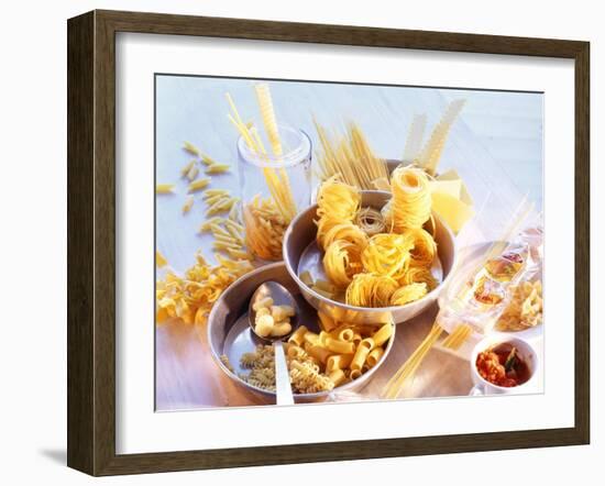 Lots of Different Types of Pasta in Dishes, Tomato Sauce-Ulrike Holsten-Framed Photographic Print