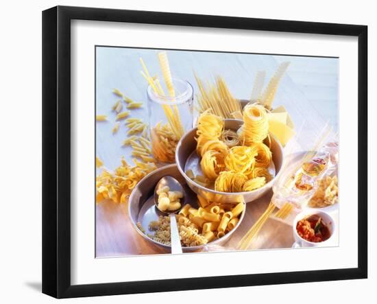 Lots of Different Types of Pasta in Dishes, Tomato Sauce-Ulrike Holsten-Framed Photographic Print