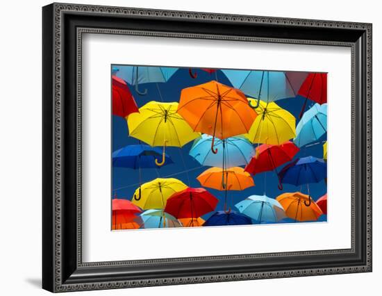 Lots of Umbrellas Coloring the Sky in the City of Agueda, Portugal-Hugo Felix-Framed Photographic Print