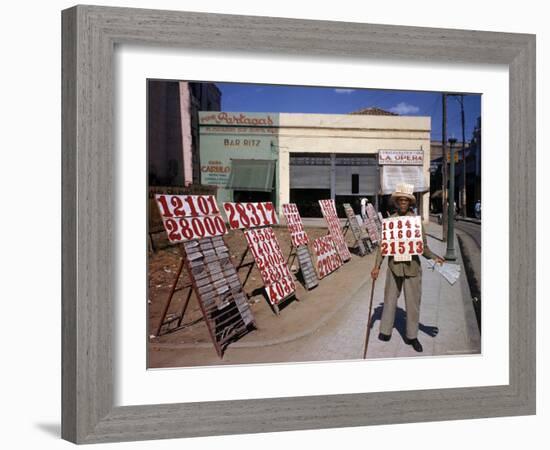 Lottery Ticket Vendor-Eliot Elisofon-Framed Photographic Print