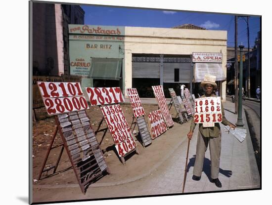 Lottery Ticket Vendor-Eliot Elisofon-Mounted Photographic Print