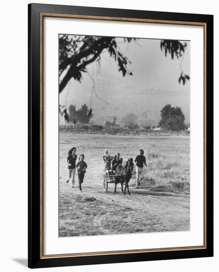 Louie Elias and Family, Riding in Their Pony Cart-Michael Rougier-Framed Premium Photographic Print