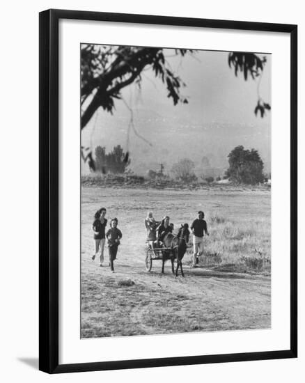 Louie Elias and Family, Riding in Their Pony Cart-Michael Rougier-Framed Premium Photographic Print