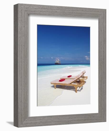 Lounge Chairs on Beach and Yacht, Maldives, Indian Ocean, Asia-Sakis Papadopoulos-Framed Photographic Print