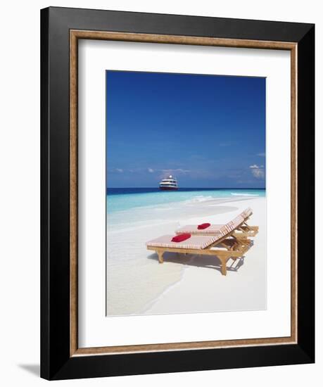 Lounge Chairs on Beach and Yacht, Maldives, Indian Ocean, Asia-Sakis Papadopoulos-Framed Photographic Print