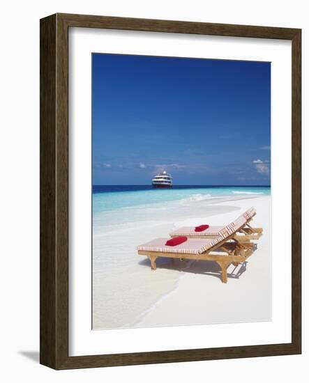 Lounge Chairs on Beach and Yacht, Maldives, Indian Ocean, Asia-Sakis Papadopoulos-Framed Photographic Print