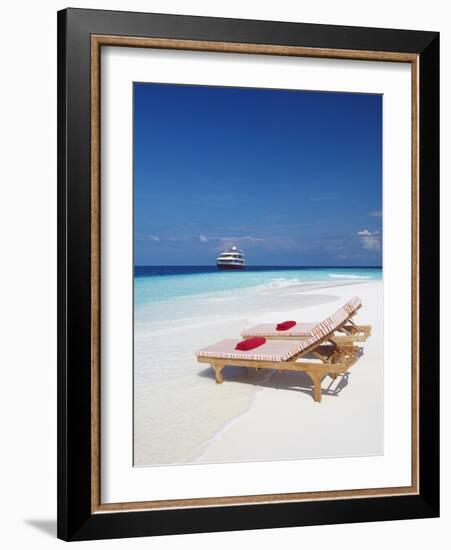 Lounge Chairs on Beach and Yacht, Maldives, Indian Ocean, Asia-Sakis Papadopoulos-Framed Photographic Print