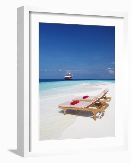 Lounge Chairs on Beach and Yacht, Maldives, Indian Ocean, Asia-Sakis Papadopoulos-Framed Photographic Print