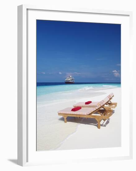 Lounge Chairs on Beach and Yacht, Maldives, Indian Ocean, Asia-Sakis Papadopoulos-Framed Photographic Print