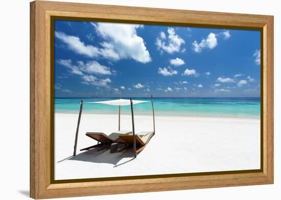 Lounge chairs on tropical white sandy beach, The Maldives, Indian Ocean, Asia-Sakis Papadopoulos-Framed Premier Image Canvas