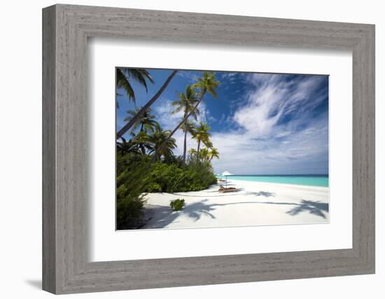 Lounge chairs under shade of umbrella on tropical beach, Maldives, Indian Ocean, Asia-Sakis Papadopoulos-Framed Photographic Print