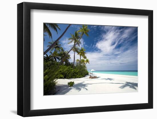 Lounge chairs under shade of umbrella on tropical beach, Maldives, Indian Ocean, Asia-Sakis Papadopoulos-Framed Photographic Print