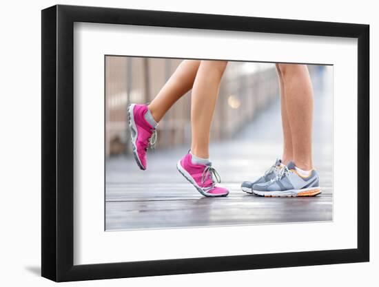Love Sport Concept - Running Couple Kissing. Closeup of Running Shoes and Girl Standing on Toes to-Maridav-Framed Photographic Print