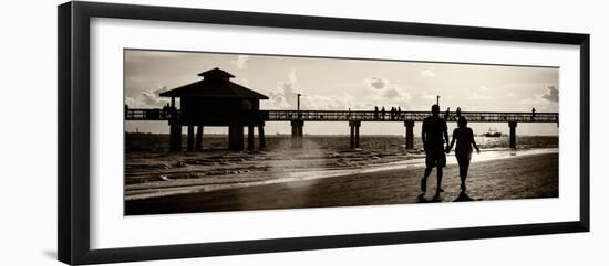 Loving Couple walking along the Beach at Sunset-Philippe Hugonnard-Framed Photographic Print