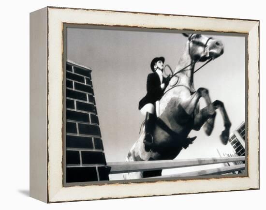 Low Angle View of a Jockey And a Horse Jumping Over a Hurdle-null-Framed Premier Image Canvas