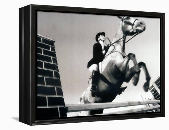 Low Angle View of a Jockey And a Horse Jumping Over a Hurdle-null-Framed Premier Image Canvas