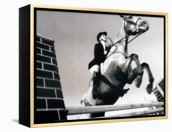 Low Angle View of a Jockey And a Horse Jumping Over a Hurdle-null-Framed Premier Image Canvas