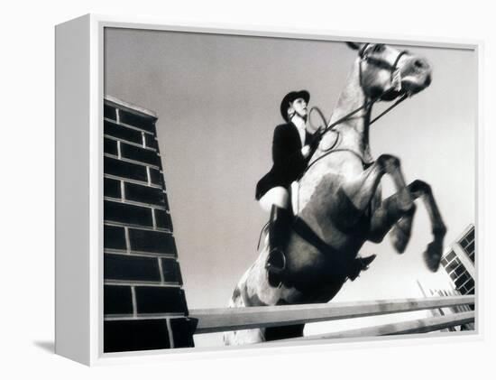 Low Angle View of a Jockey And a Horse Jumping Over a Hurdle-null-Framed Premier Image Canvas