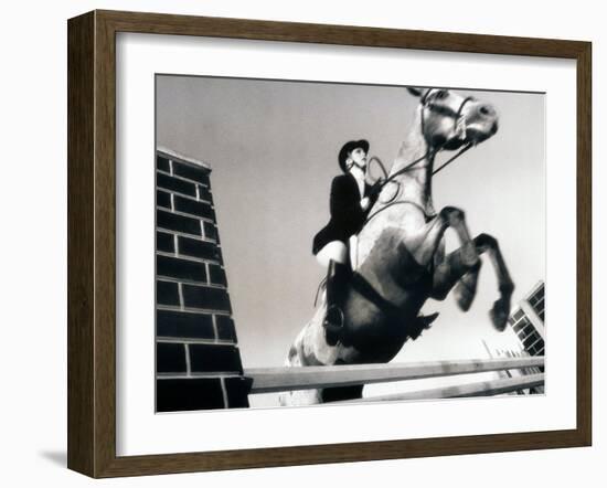 Low Angle View of a Jockey And a Horse Jumping Over a Hurdle-null-Framed Photographic Print