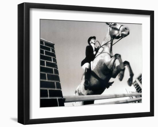 Low Angle View of a Jockey And a Horse Jumping Over a Hurdle-null-Framed Photographic Print