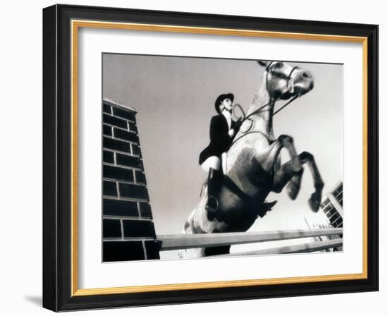 Low Angle View of a Jockey And a Horse Jumping Over a Hurdle-null-Framed Photographic Print