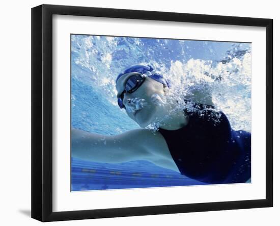 Low Angle View of a Mid Adult Woman Swimming Underwater-null-Framed Photographic Print