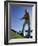 Low Angle View of a Senior Man Swinging a Golf Club-null-Framed Photographic Print