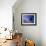 Low Angle View of a Teenage Girl Riding a Surfboard-George Silk-Framed Photographic Print displayed on a wall