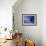 Low Angle View of a Teenage Girl Riding a Surfboard-George Silk-Framed Photographic Print displayed on a wall