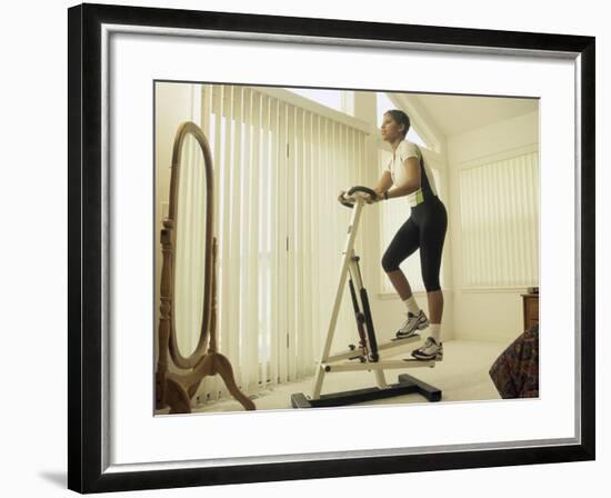 Low Angle View of a Woman Exercising-null-Framed Photographic Print