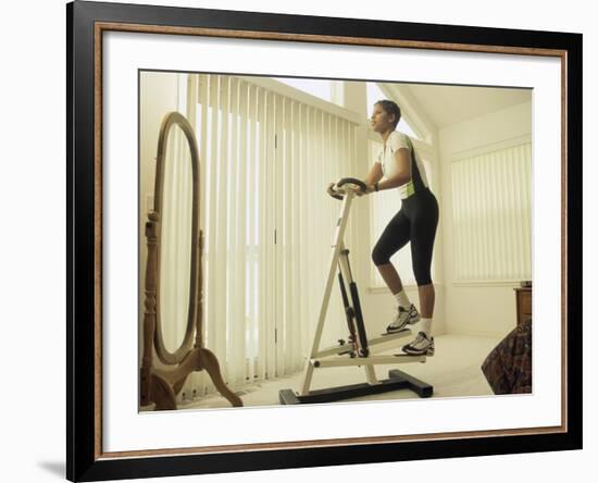 Low Angle View of a Woman Exercising-null-Framed Photographic Print