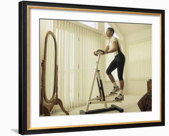 Low Angle View of a Woman Exercising-null-Framed Photographic Print