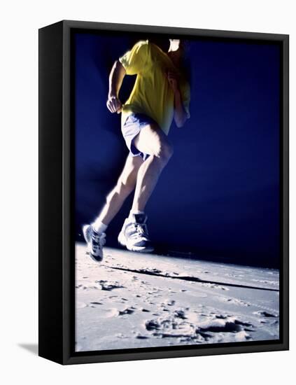 Low Angle View of a Young Man Running on the Beach-null-Framed Premier Image Canvas
