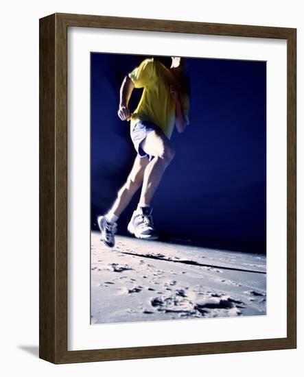 Low Angle View of a Young Man Running on the Beach-null-Framed Photographic Print