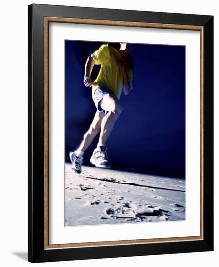 Low Angle View of a Young Man Running on the Beach-null-Framed Photographic Print