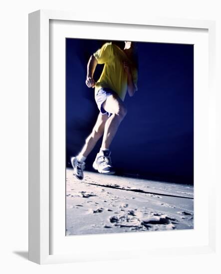 Low Angle View of a Young Man Running on the Beach-null-Framed Photographic Print