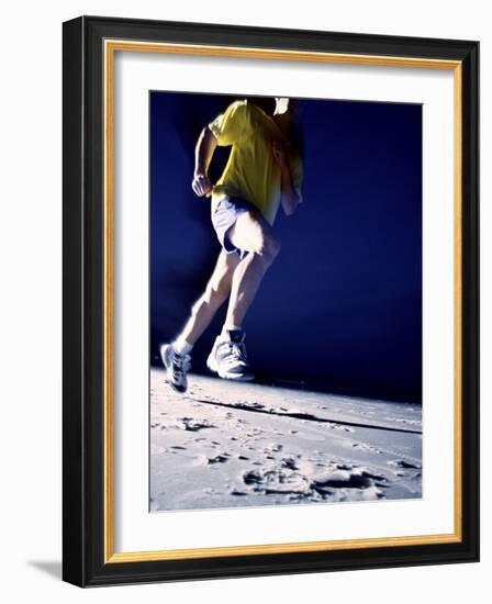 Low Angle View of a Young Man Running on the Beach-null-Framed Photographic Print