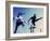 Low Angle View of Athletes Jumping over Hurdles-null-Framed Photographic Print