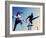 Low Angle View of Athletes Jumping over Hurdles-null-Framed Photographic Print