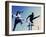 Low Angle View of Athletes Jumping over Hurdles-null-Framed Photographic Print