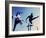 Low Angle View of Athletes Jumping over Hurdles-null-Framed Photographic Print